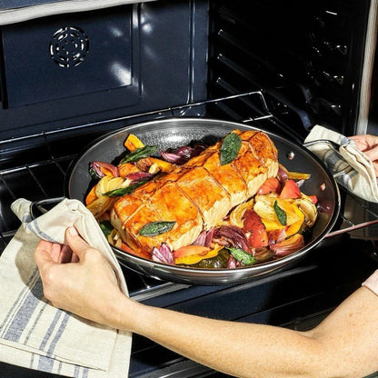 HexClad Hybrid Nonstick 14-Inch Frying Pan with Tempered Glass Lid - $219 MSRP